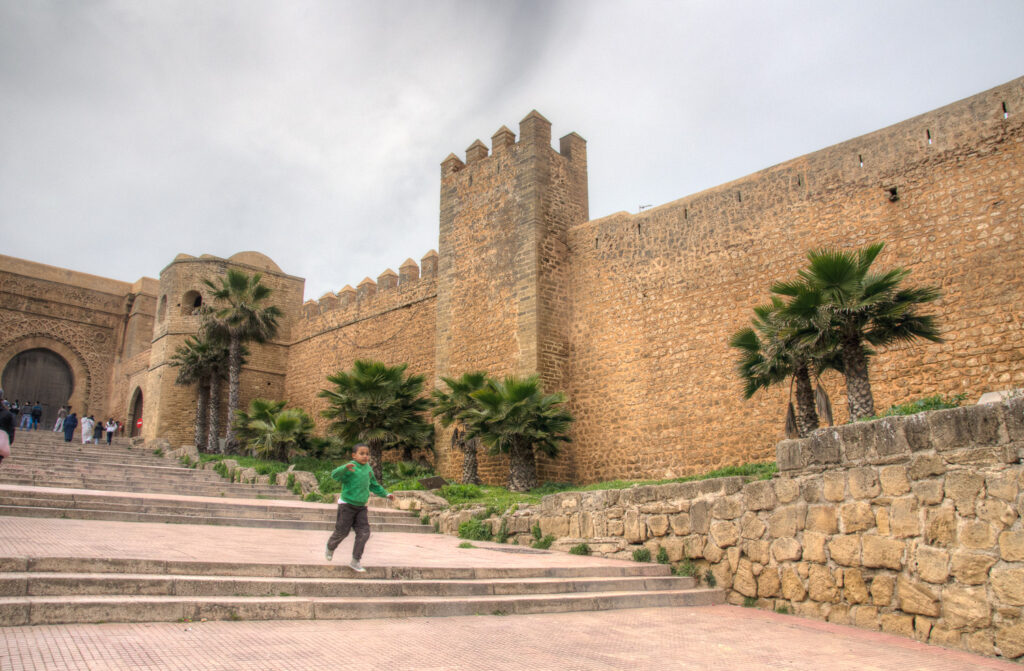 Boy Running down Steps Rabat Morocco