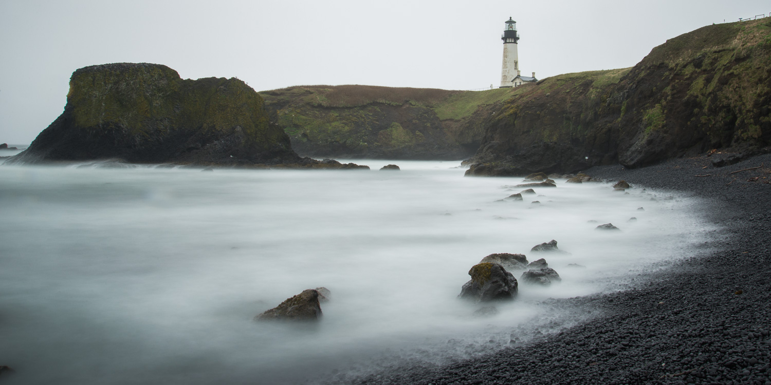 Tides of Mist - Yaquina Head Lighthouse from the Beach - Newport Oregon